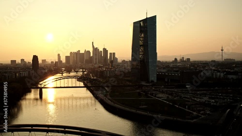 Scenic cityscape and river view at sunset, Frankfurt, Hesse, Germany photo