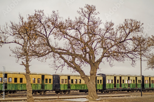 Old narrow gauge Railroad coaches at an abondoned Station photo