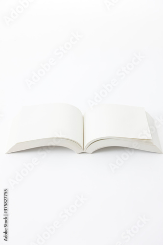 opened book on white background