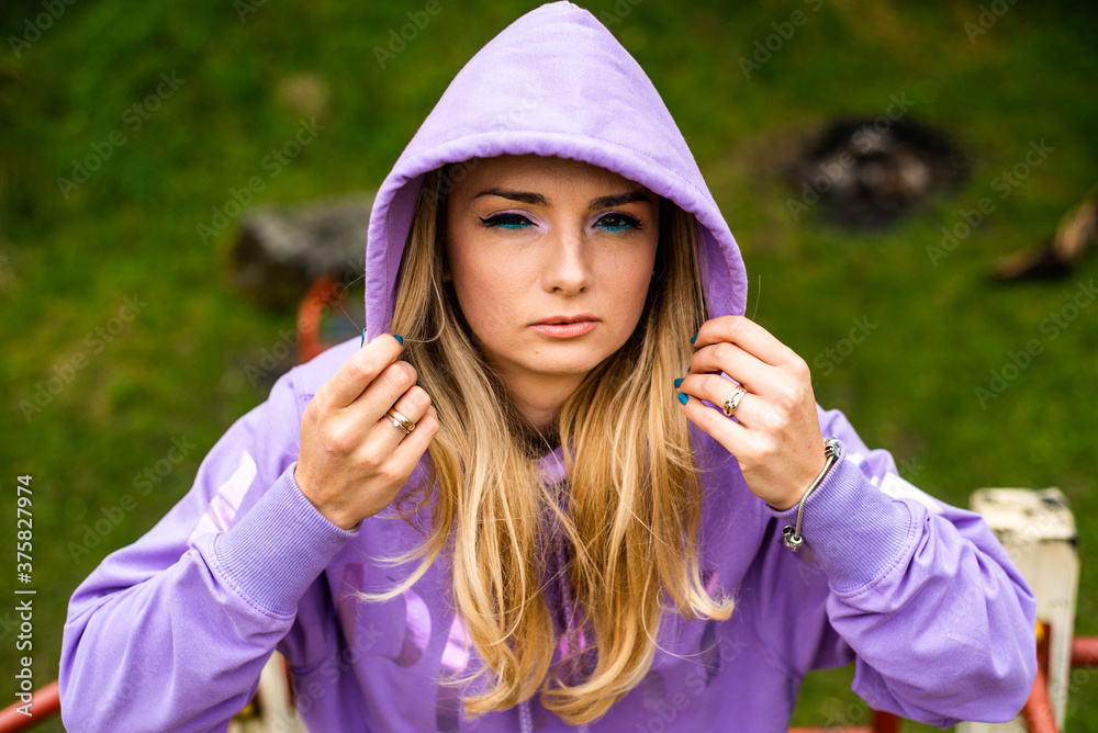 Blond woman in a sports suit outdoor Blond woman in a sports suit outdoor