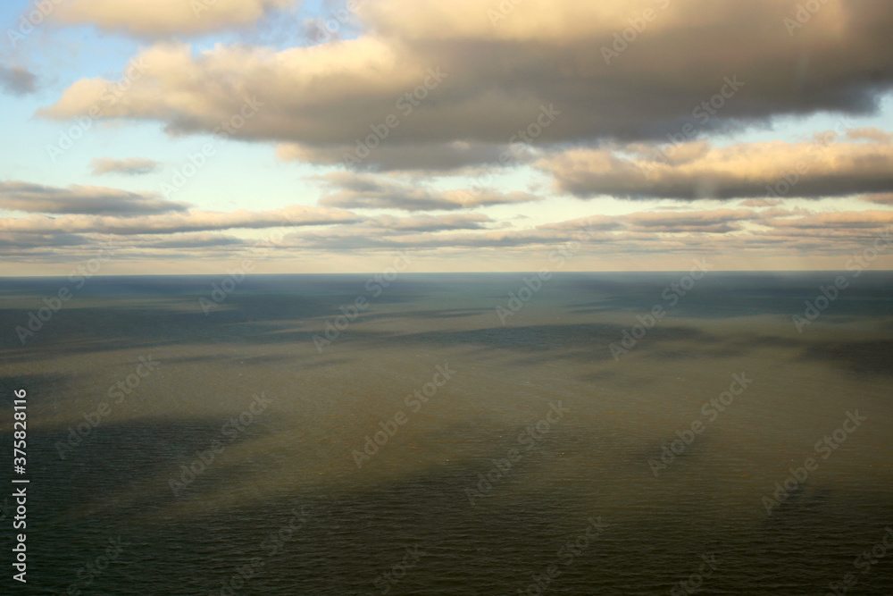 Aerial View Of Lake Michigan and Clouds Near Sunset Aerial View Of Lake Michigan and Clouds Near Sunset