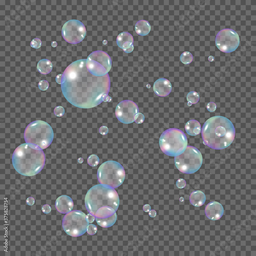 Realistic rainbow color bubbles. Soap bubbles isolated on transparent background. Vector