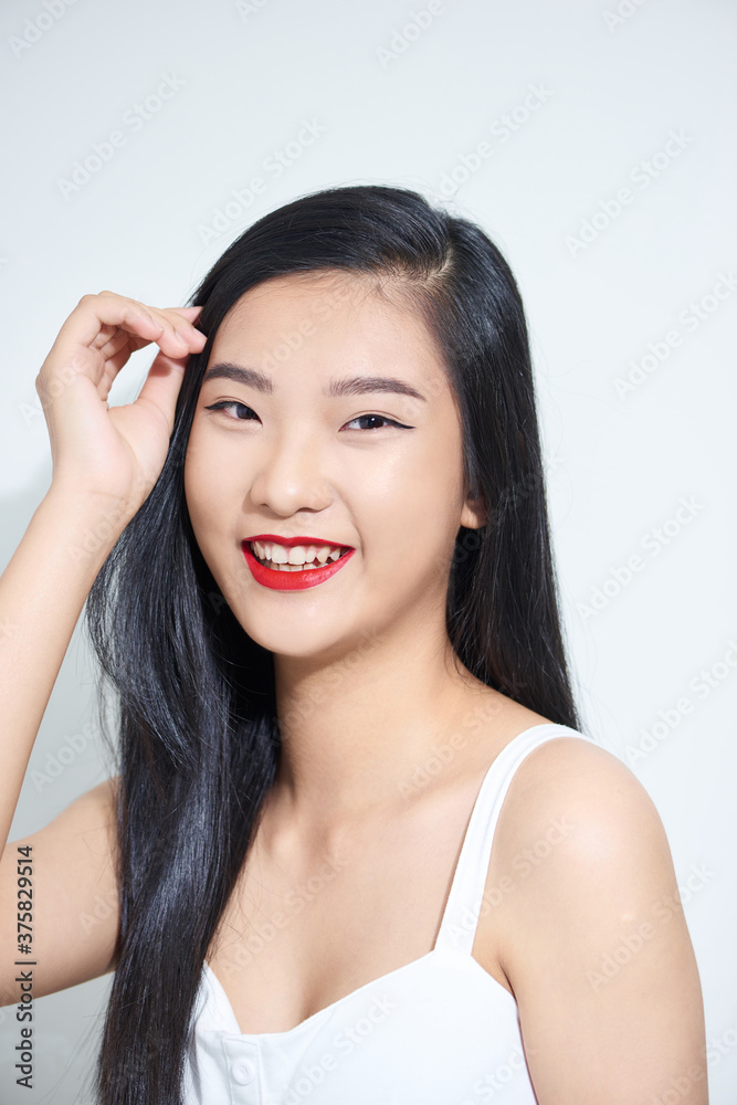 Close up young Asian woman with smiley face, grunge vintage style. Close up young Asian woman with smiley face, grunge vintage style.