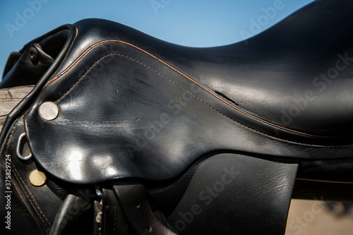 Close up view of leather black horse saddle. © nataliiaGL