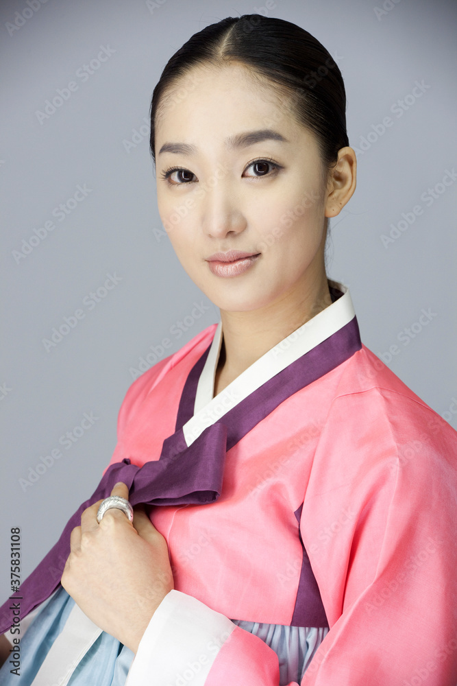 young woman in korean traditional clothing, hanbok young woman in korean traditional clothing, hanbok
