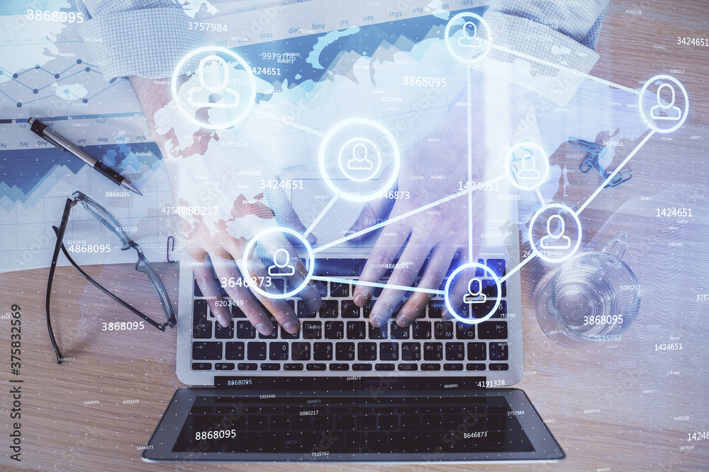Social network theme hologram with businessman working on computer on background. Concept of world wide web. Double exposure. Social network theme hologram with businessman working on computer on background. Concept of world wide web. Double exposure.