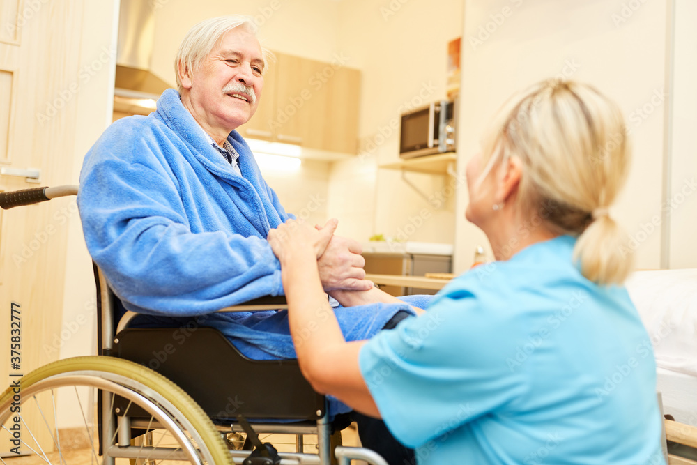 Obraz premium Caregiver cares for senior caring