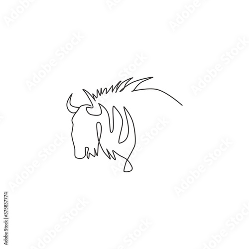 One continuous line drawing of stout wildebeest head for company logo identity. Big gnu mammal mascot concept for national conservation park icon. Modern single line draw design vector illustration