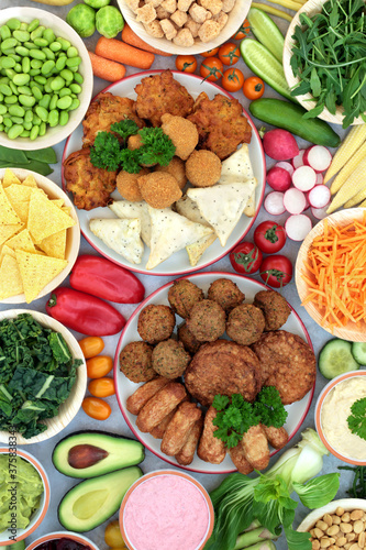 Health food for a nutritious vegan diet, with plant based burgers, sausages, balls, samosas & onion bhajis with vegetables, dips, legumes & snacks. High in protein, minerals, vitamins & antioxidants.