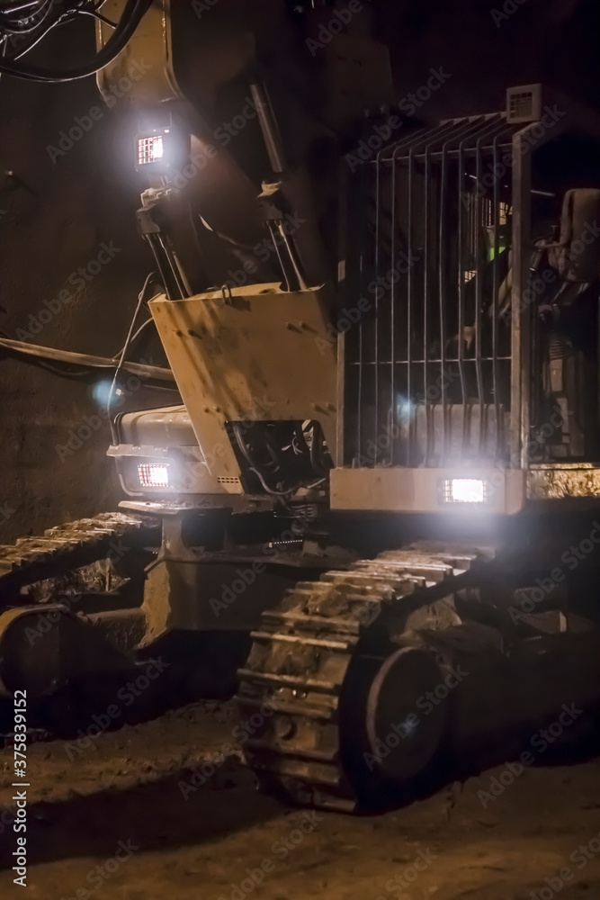 bulldozer in a tunnel, working atmosphere bulldozer in a tunnel, working atmosphere