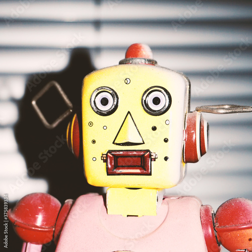 Tin robot looking very amazed photo