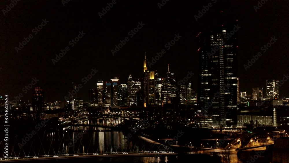 Illuminated cityscape at night, Frankfurt, Hesse, Germany Illuminated cityscape at night, Frankfurt, Hesse, Germany