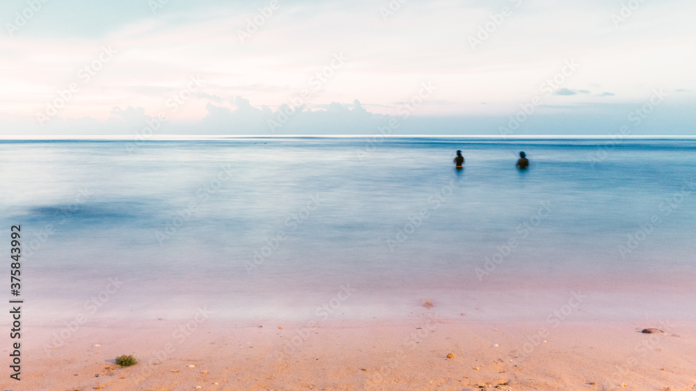 Two Balinese Fishermen Fishing in Indian Ocean Two Balinese Fishermen Fishing in Indian Ocean