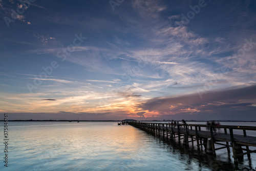 Wallpaper Mural People fishing on a pier at twilight Torontodigital.ca