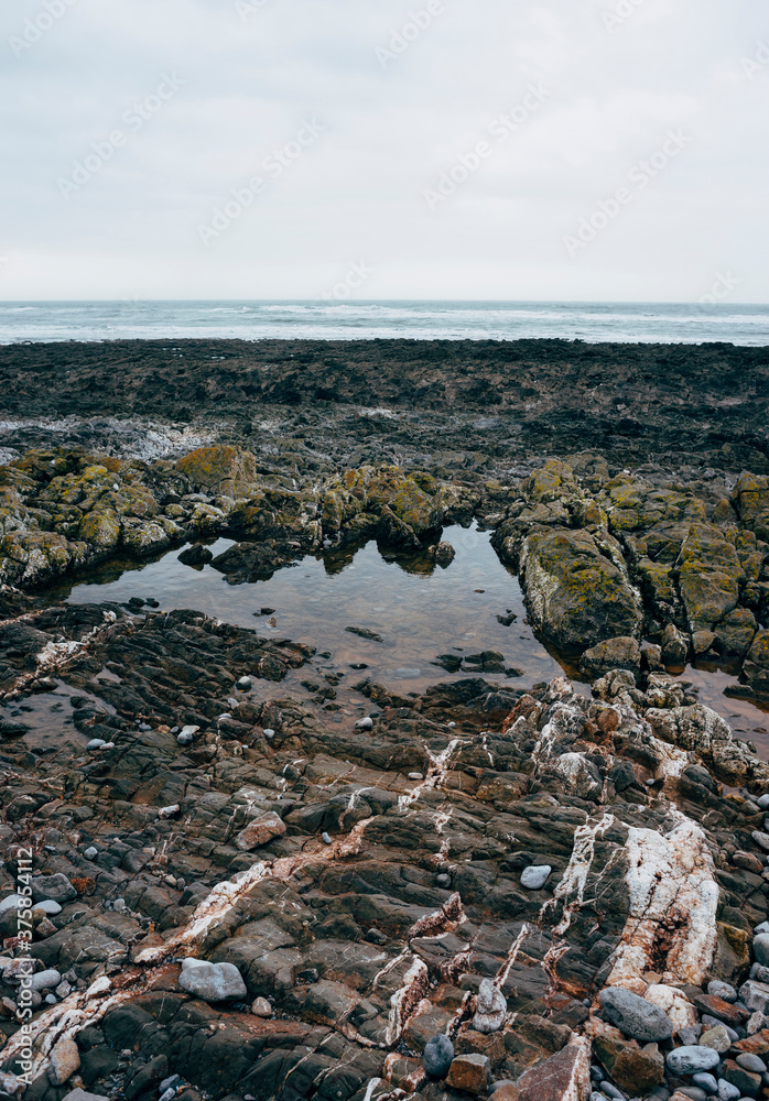 Rocks at low tide. Worms Head, Rhossili, Wales, UK. Rocks at low tide. Worms Head, Rhossili, Wales, UK.
