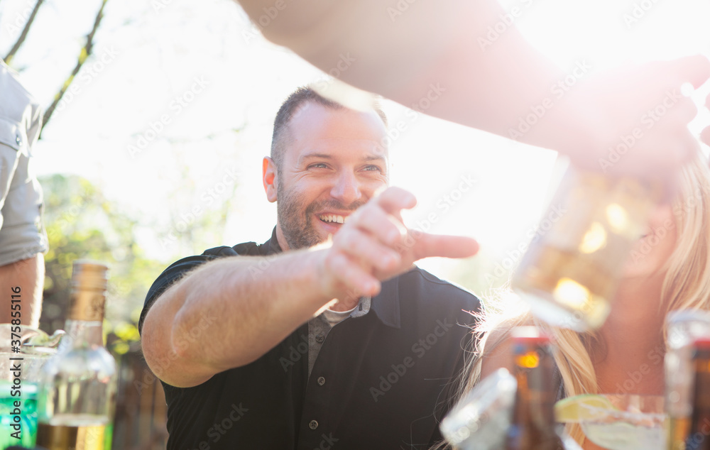 Cinco: Man Reaches For Mexican Beer Cinco: Man Reaches For Mexican Beer