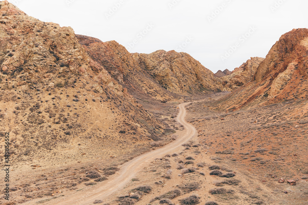 Trail in the Charyn canyon, Kazakhstan Trail in the Charyn canyon, Kazakhstan