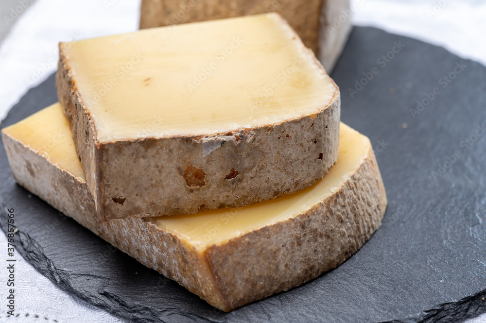 French cheese Comte, three varieties 1 year matured Prestige, fruity flavoured Fruite and Vieille Reserve French cheese Comte, three varieties 1 year matured Prestige, fruity flavoured Fruite and Vieille Reserve