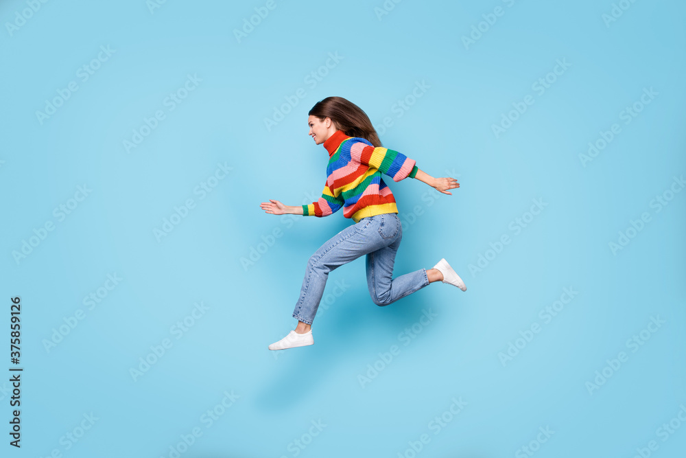 Full length body size profile side view of her she nice attractive energetic cheerful girl jumping running fast speed discount isolated blue pastel color background