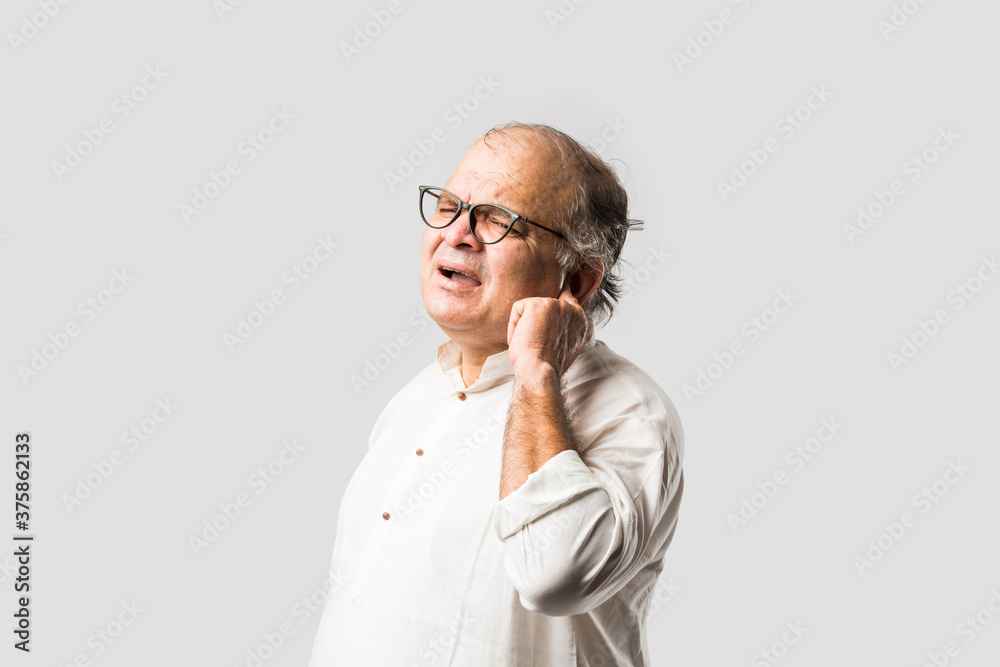 © StockImageFactory - Indian senior or old man having ache or body pain, sad expressions