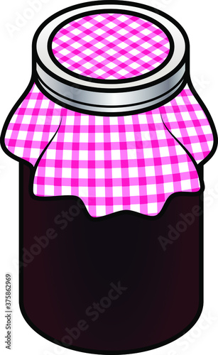 A jar of home made jam covered with a red checked cloth. Dark red blackberry, mulberry, plum.