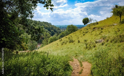 Cliffs of Cheddar Gorge from high viewpoint. High limestone cliffs in canyon in Mendip Hills in Somerset, England