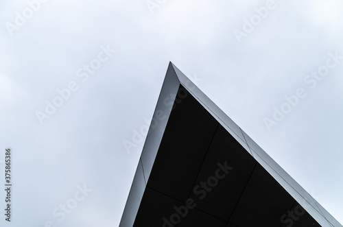 Modern Building with Overcast Sky Background