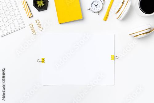Flat lay workplace desktop with blank paper mockup
