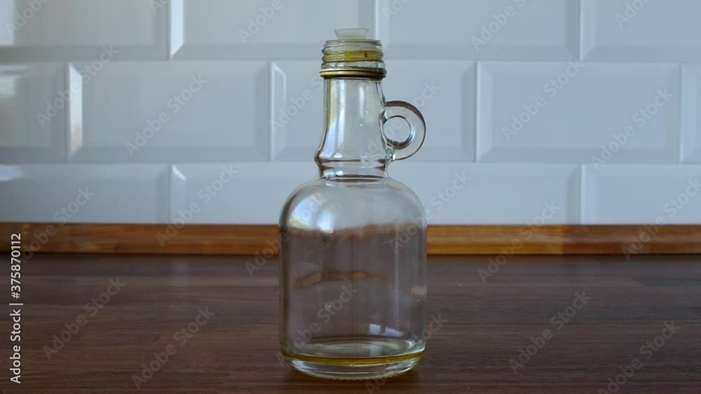 Filling an olive oil bottle Filling an olive oil bottle