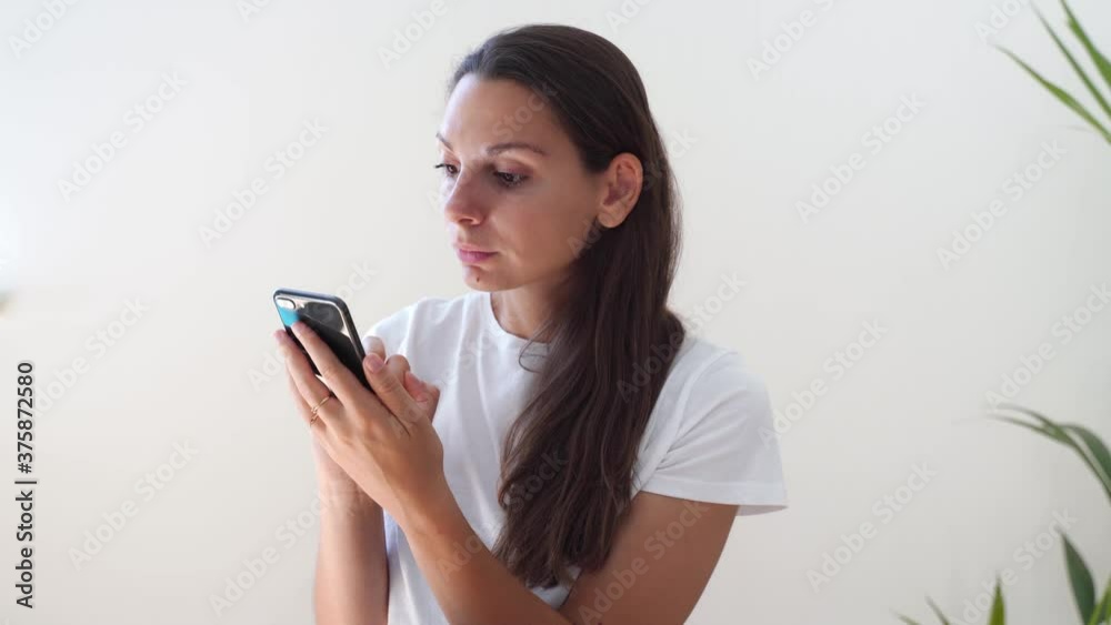 Young caucasian woman with phone. Censorship in internet. Young caucasian woman with phone. Censorship in internet.