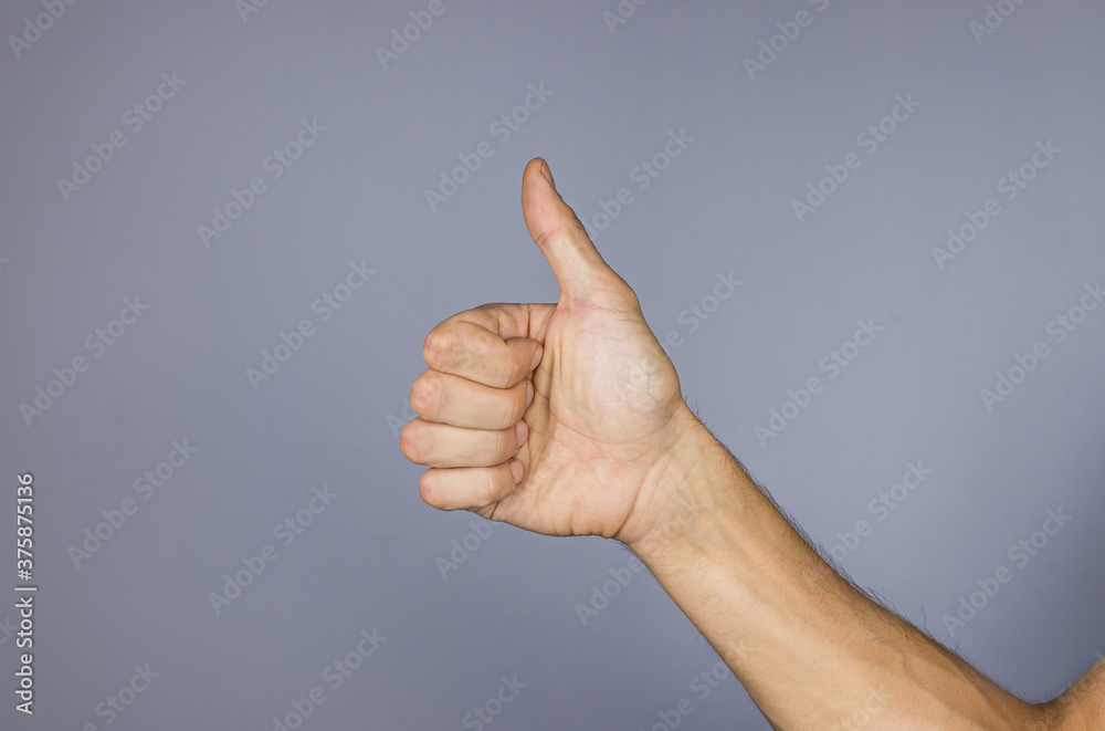 Hand showing thumb up Hand showing thumb up