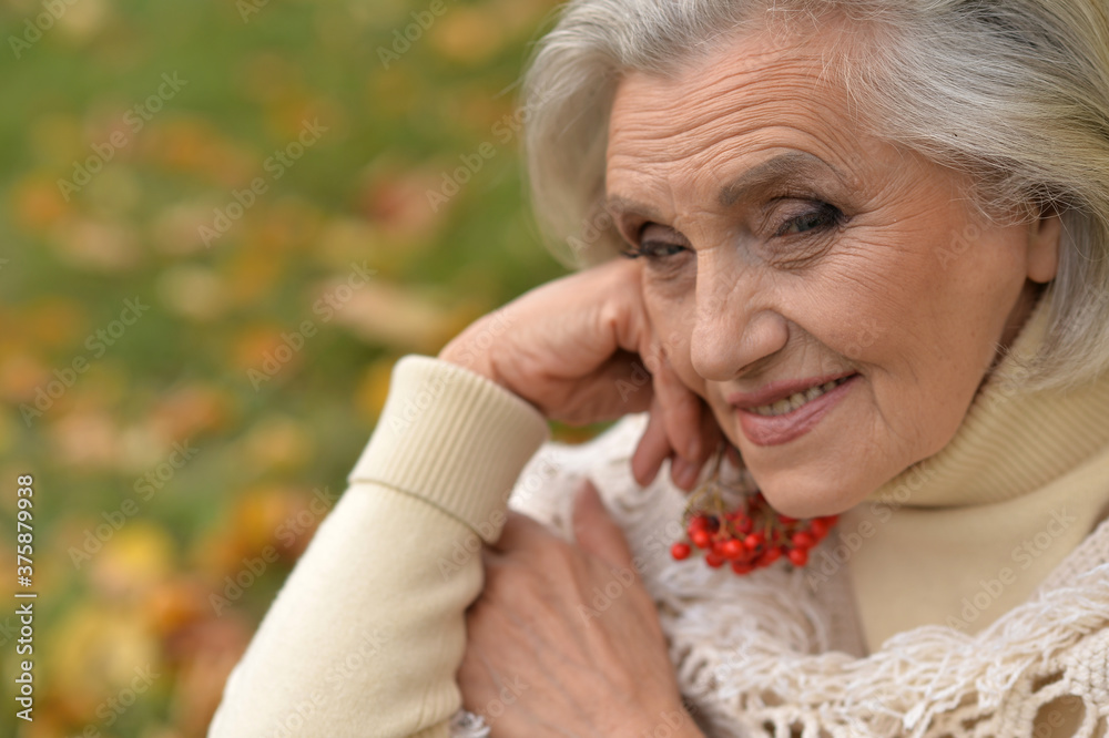 Portrait of happy senior beautiful woman with berries Portrait of happy senior beautiful woman with berries