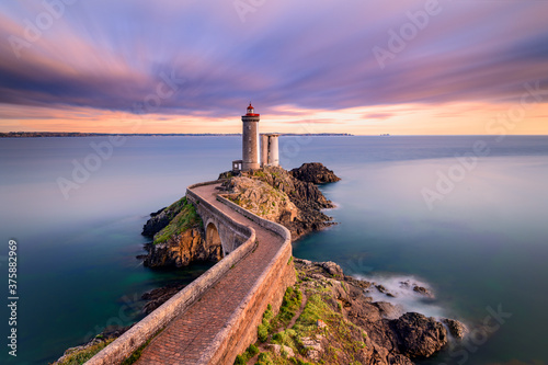 Petit Minou Lighthouse at sunset. It indicates to the boats wishing to go to Brest, the route to follow to enter the harbor. It forms an alignment with the Portzic lighthouse. It also has a red sector