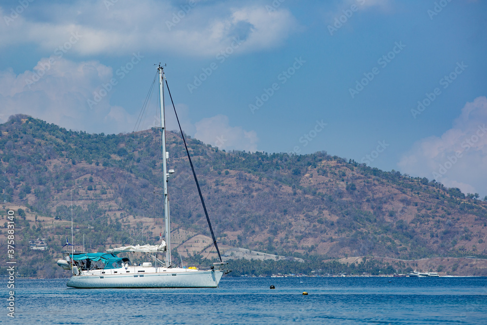 white yacht on a background of mountains white yacht on a background of mountains