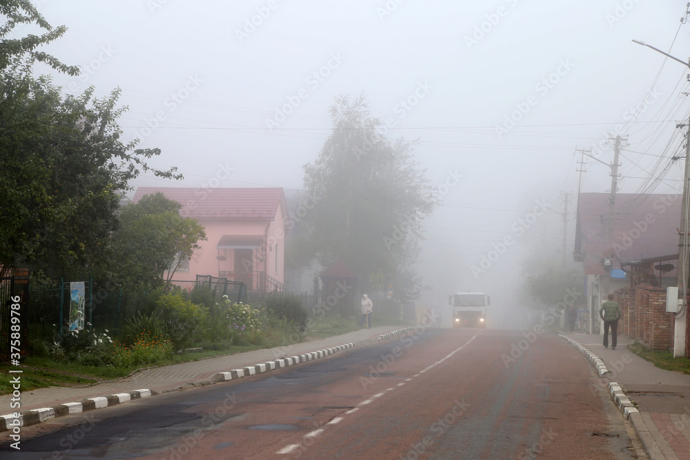 morning fog on a city street