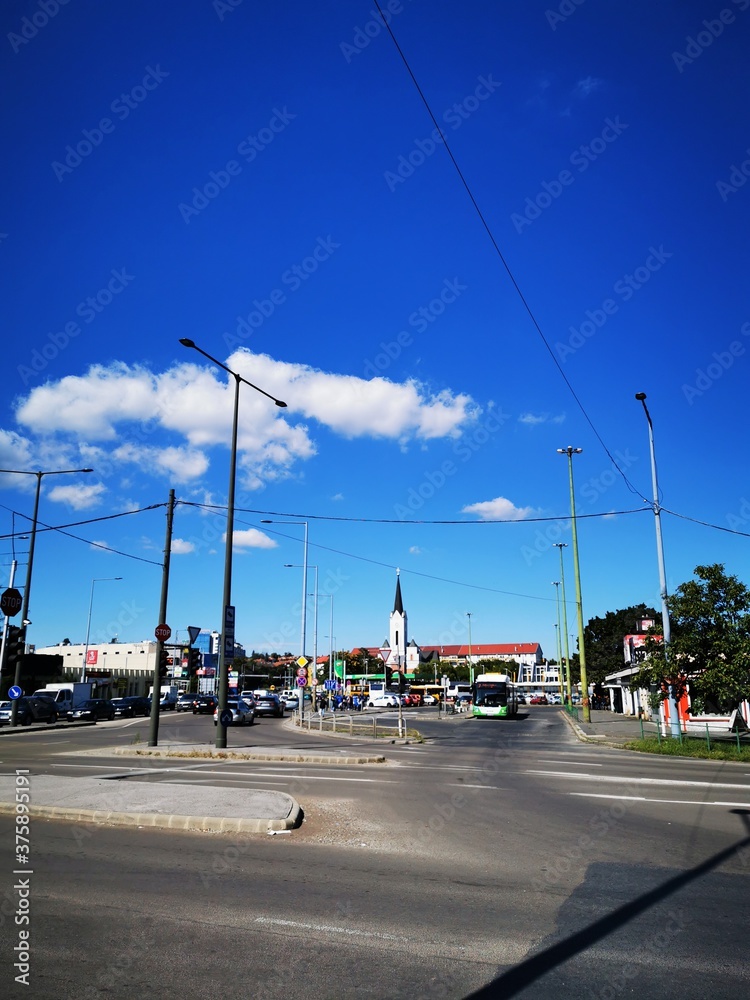 Junction in downtown Miskolc with the view of the Wheat Square Church