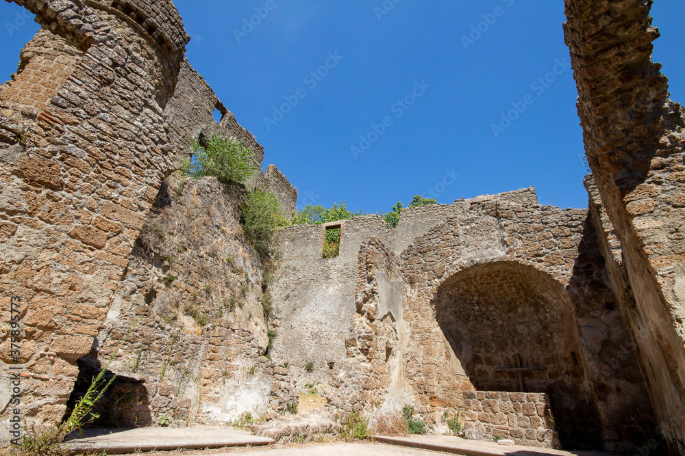 Ruins of an ancient medieval town called Antica Monterano or Monterano Vecchia,the city born in Etruscan times Inside the Monterano Nature Reserve.Lazio,Italy. Ruins of an ancient medieval town called Antica Monterano or Monterano Vecchia,the city born in Etruscan times Inside the Monterano Nature Reserve.Lazio,Italy.