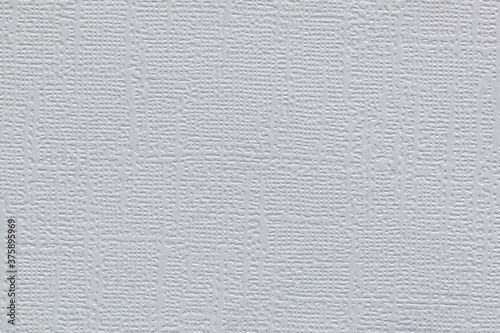 Plain white textured cardstock, full frame background image copy space color swatch sample. photo