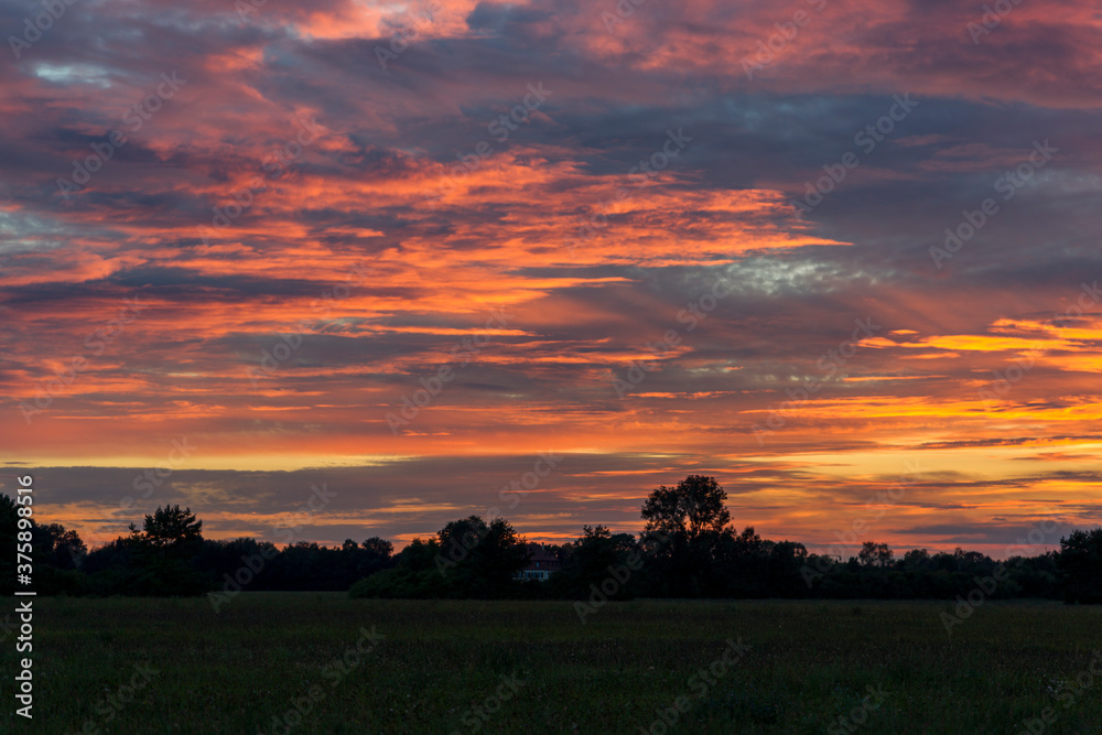 Sunset over the orchards in Siebenbrunn near Augsburg Sunset over the orchards in Siebenbrunn near Augsburg