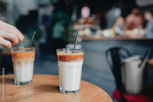 cup of coffee on wooden background, relax time, latte photo