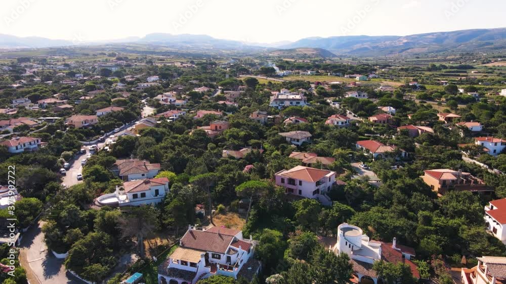Ascending aerial panoramic drone view of a village in Sardinia, Italy Ascending aerial panoramic drone view of a village in Sardinia, Italy