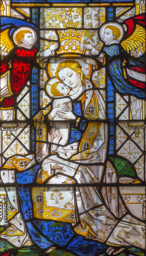 LONDON, GREAT BRITAIN - SEPTEMBER 17, 2017: The detail Madonna on the stained glass in church St. Barnabas by Kempe (1930).