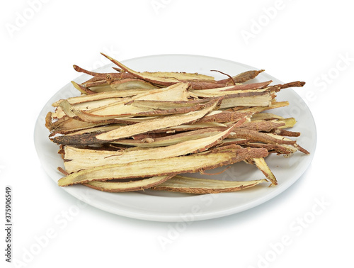 dried Liquorice roots on a white background