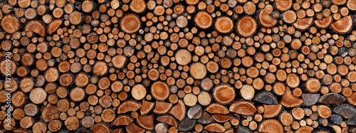 Valokuva Stack of piled up fire wood.