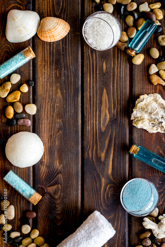 Frame of wellness set of spa cosmetics with sea salt and stones Frame of wellness set of spa cosmetics with sea salt and stones