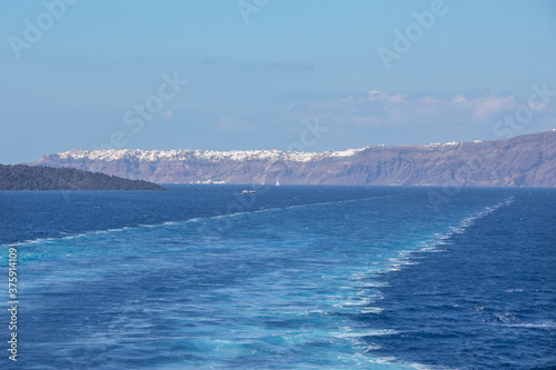 Santorini - The sea of calera with the Oia and Nea Kameni island in the background.