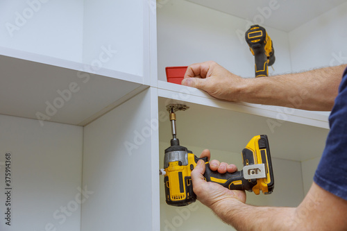 Modern fixing cabinet door hinge adjustment on kitchen cabinets
