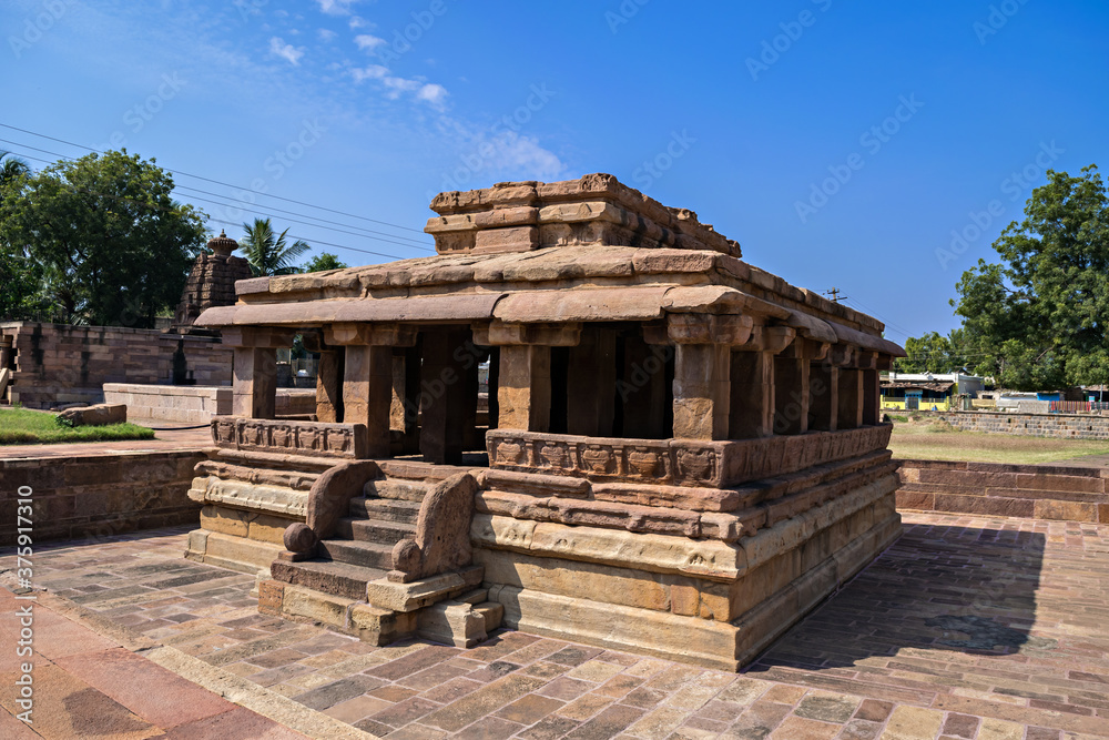 Ancient 8th century carved stone temple with beautiful blue sky at Aihole,India. Ancient 8th century carved stone temple with beautiful blue sky at Aihole,India.