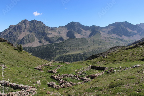 Jaw-droppingly beautiful mountains and lakes in Sant'Anna di Vinadio on a partly cloudy day. © Jake