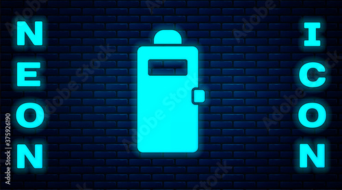 Glowing neon Police assault shield icon isolated on brick wall background. Vector.